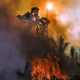 Smoke and flames rise from an illegally lit fire in Amazon rainforest reserve, south of Novo Progresso in Para state, Brazil, on August 15, 2020.